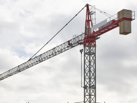 building-in-progress-and-crane-machinery-K37BCN8